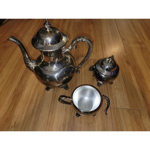 WM. A Rogers Silver Plated Tea Set.  One Piece Missing Handle other Handle has f